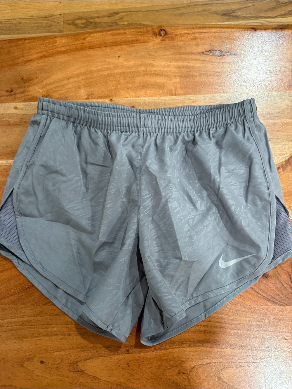 Nike Gray Athletic Running Shorts with Subtle Pattern